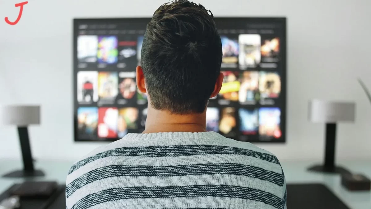 man watching tv